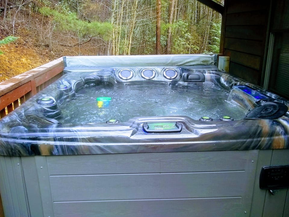 Hot tub on private back deck for your enjoyment here at Lazy Bear's Den. Relax!