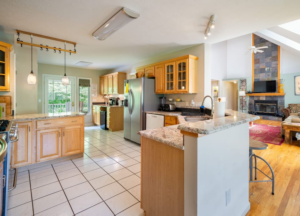 Huge well-stocked kitchen w/5-burner stove, 2 ovens, 2 fridges and big counters.