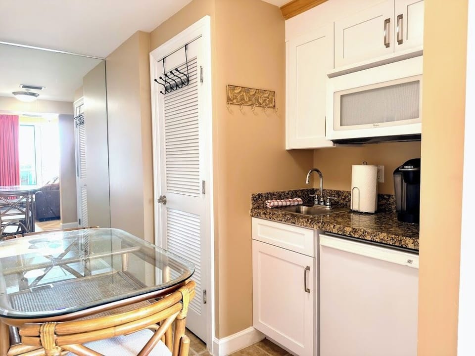 2nd Master- nice kitchenette with fridge, microwave, sink, Keurig and table.