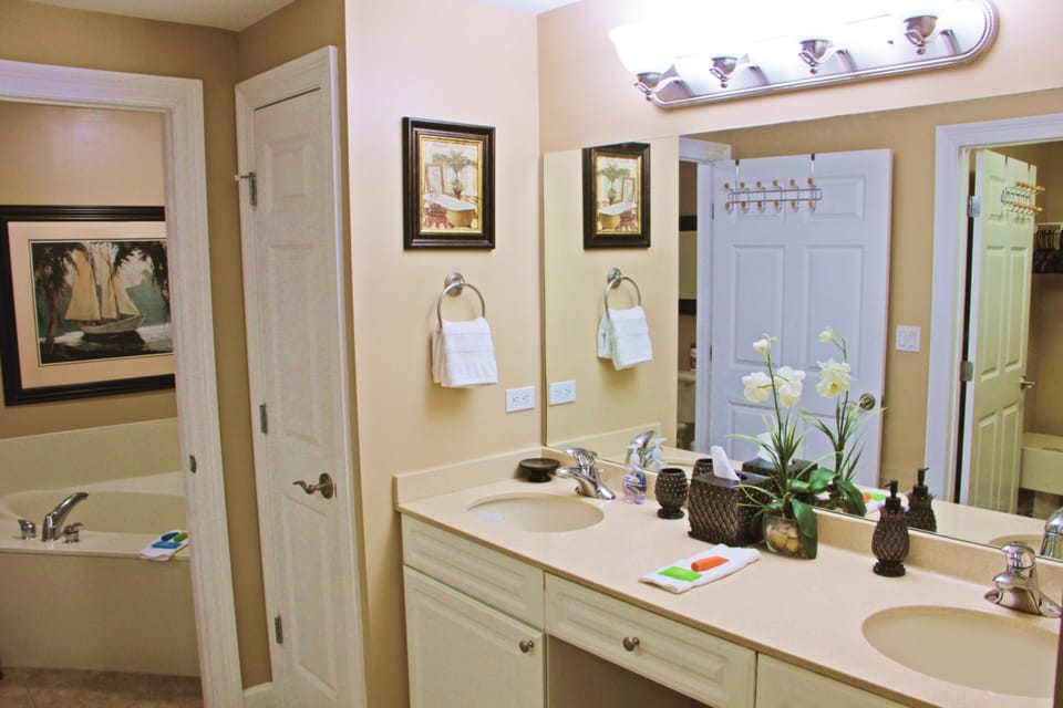 Master Bedroom Vanity area with FULL walk in closet and mounted hair dryer.
