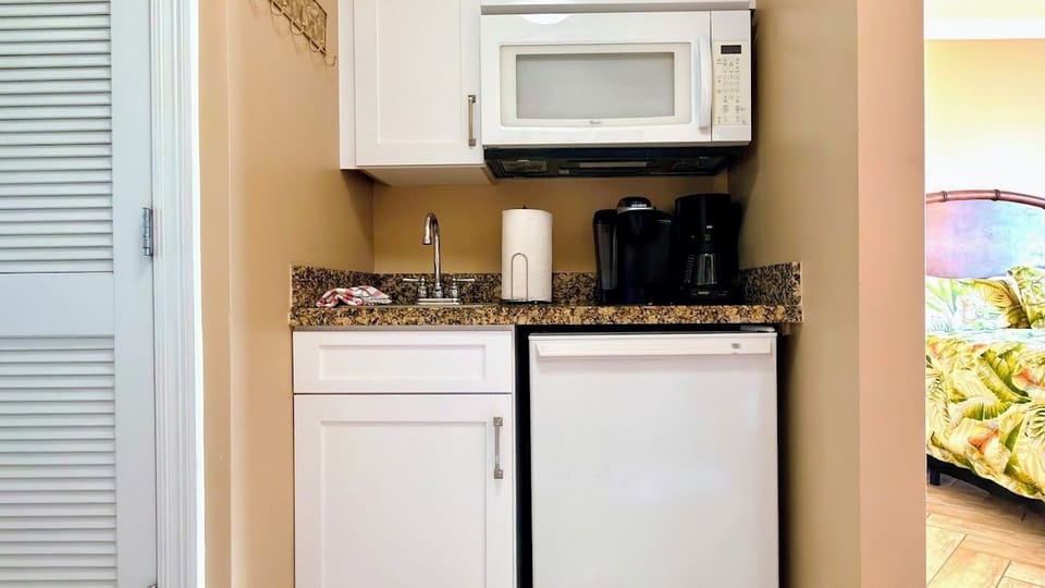 2nd Master- kitchenette area with a seperate private entrance to the suite.