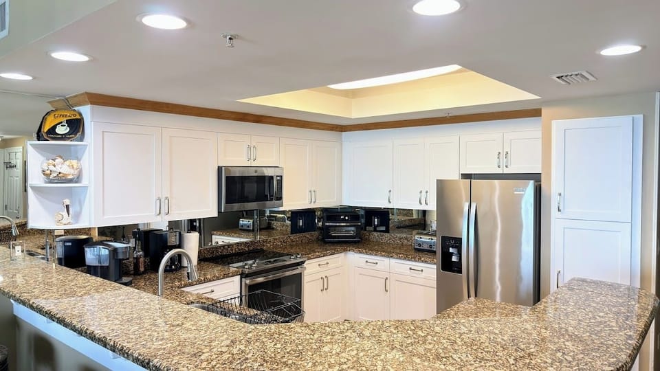 Huge Kitchen with new stainless steel appliances.  This area is stocked!