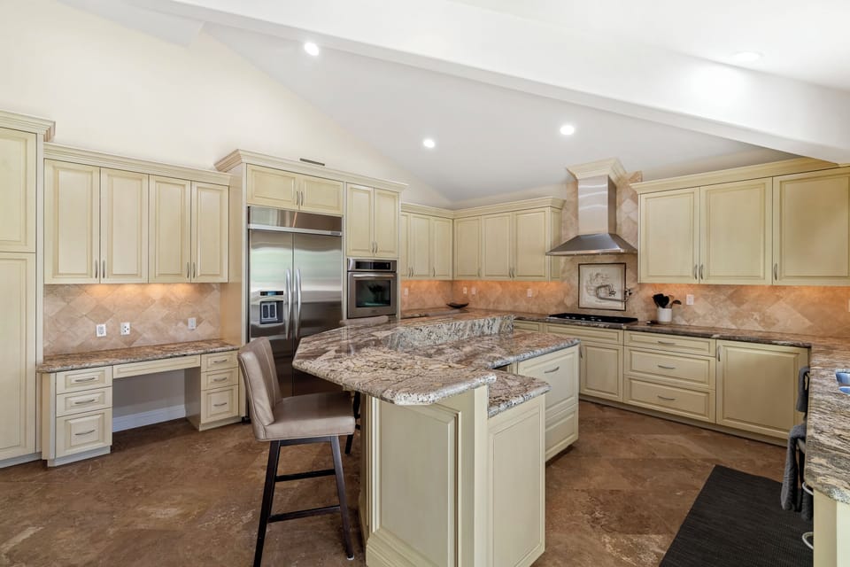 Gourmet kitchen with premium Kitchen Aid appliances
