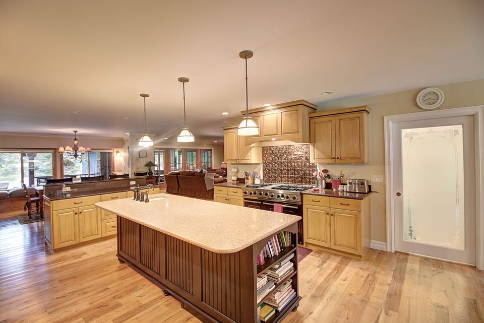 kitchen with large island and Viking range