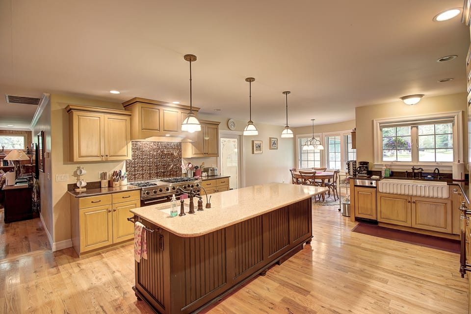 kitchen with large island and Viking range