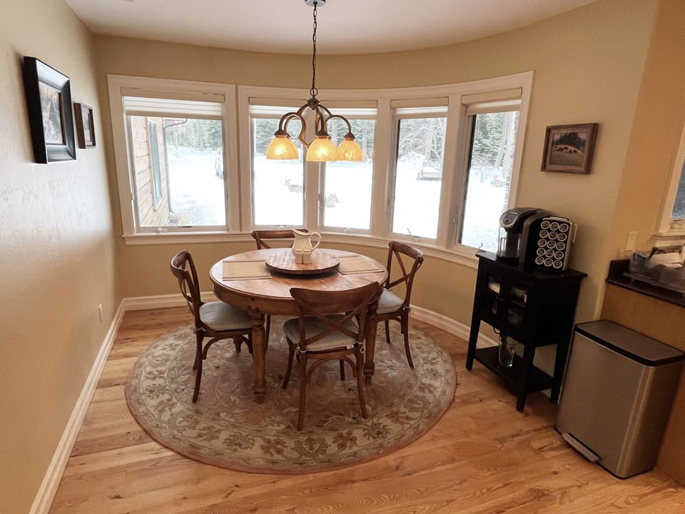 Breakfast nook with deer outside