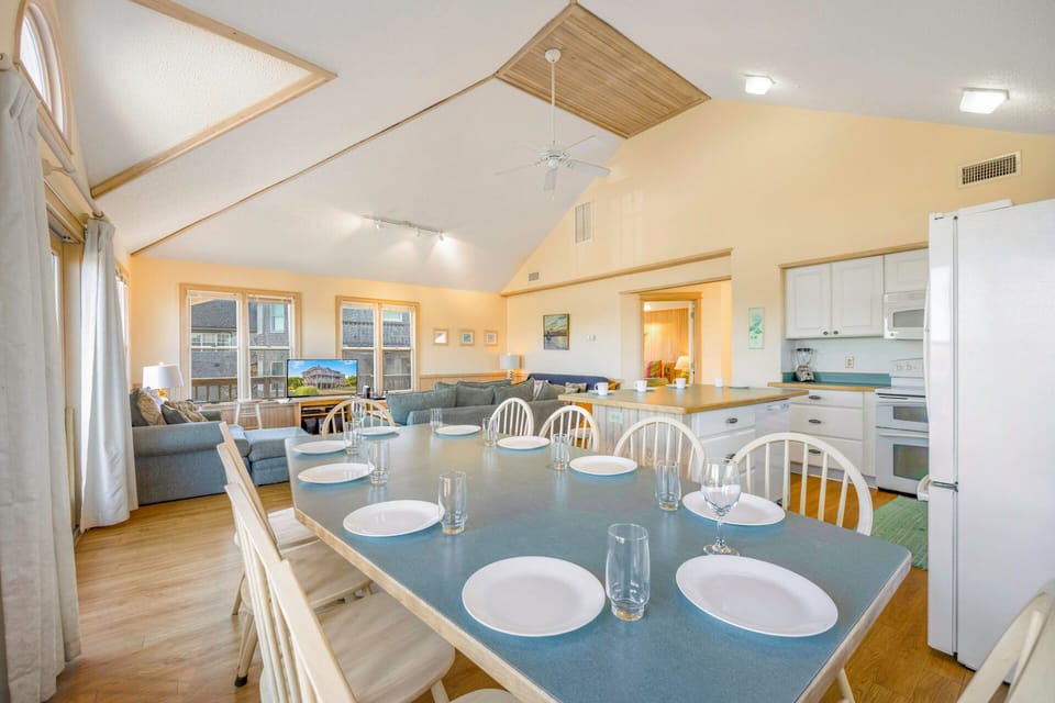 Your spacious dining area flows seamlessly into the living room, perfect for gathering with loved ones over meals and conversation.