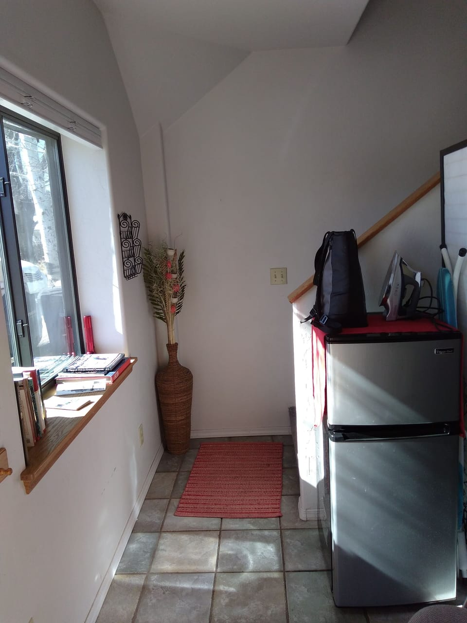Fridge with filtered water and fresh cream for coffee. 