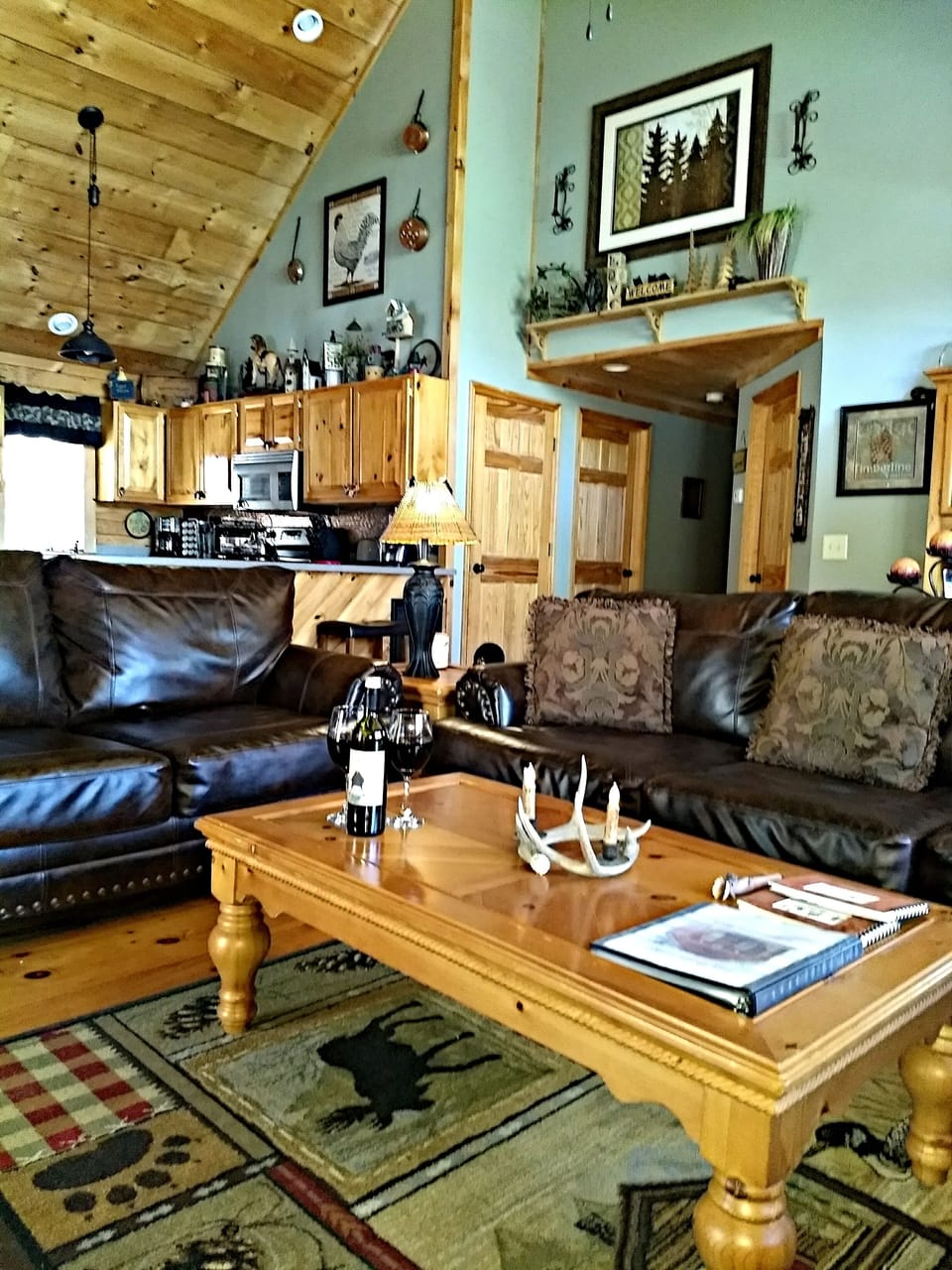 Living Room With View Of Kitchen & Hallway