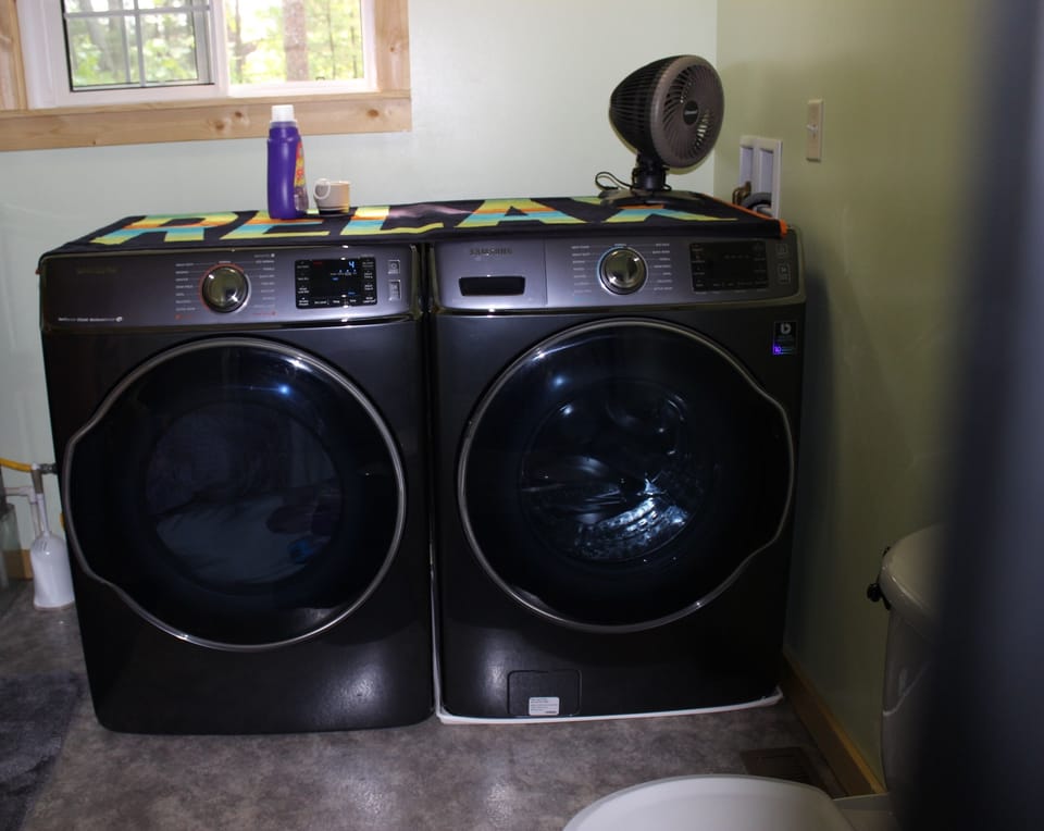 New extra large Samsung washer/dryer in bathroom