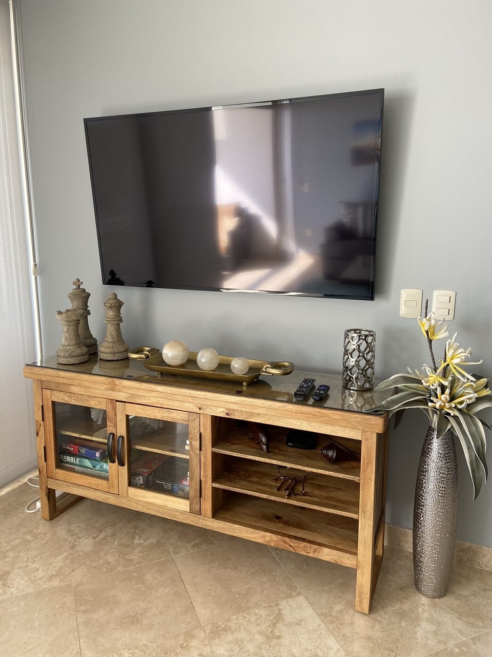 Sit back and relax in the living room with 60" TV (equipped with Roku, Netflix)