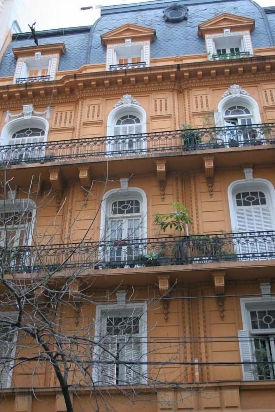 Beautiful Parisian style building - half of the top floor is the apartment