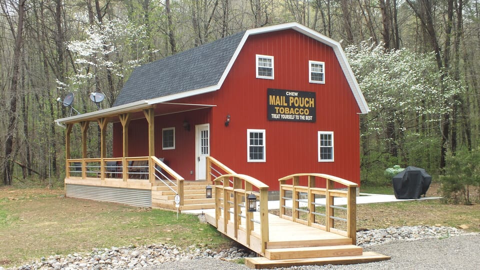 Private Amish-built Red Barn situated on 6 acres with stocked pond and firepit
