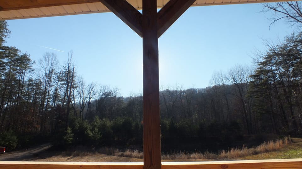 View from sunny front porch, overlooking mountain