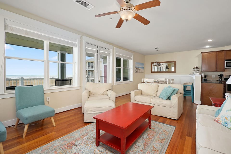 Open floor plan with fantastic ocean views from living, dining & kitchen