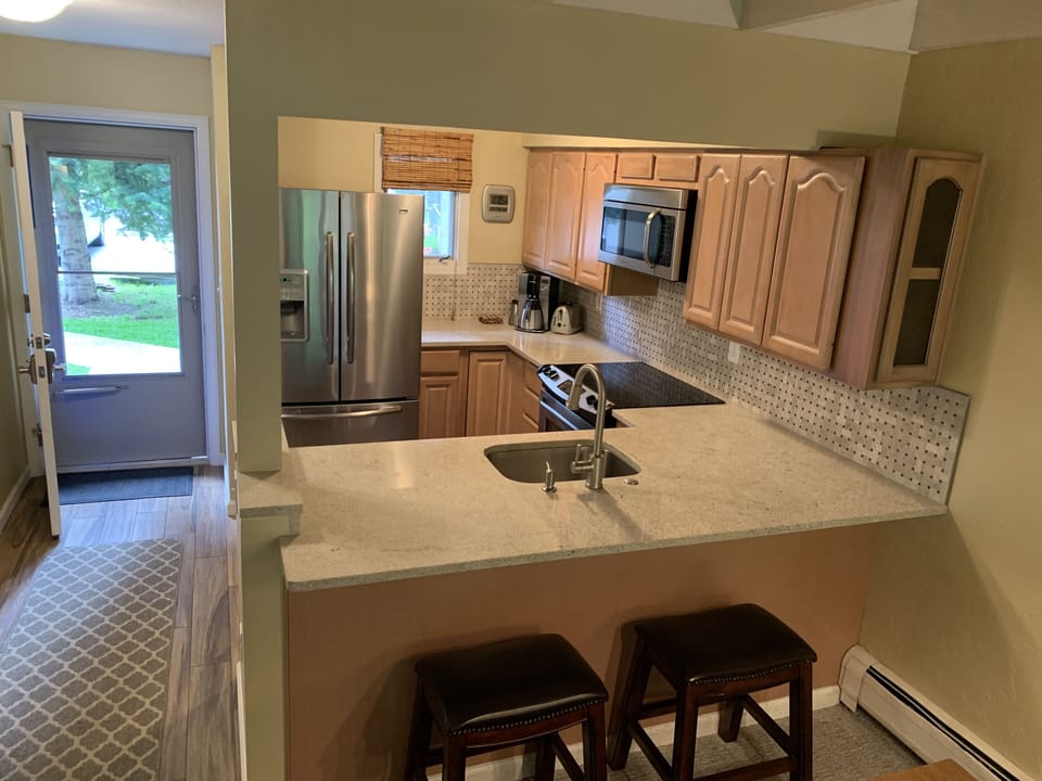 Front entry and kitchen view from dining area