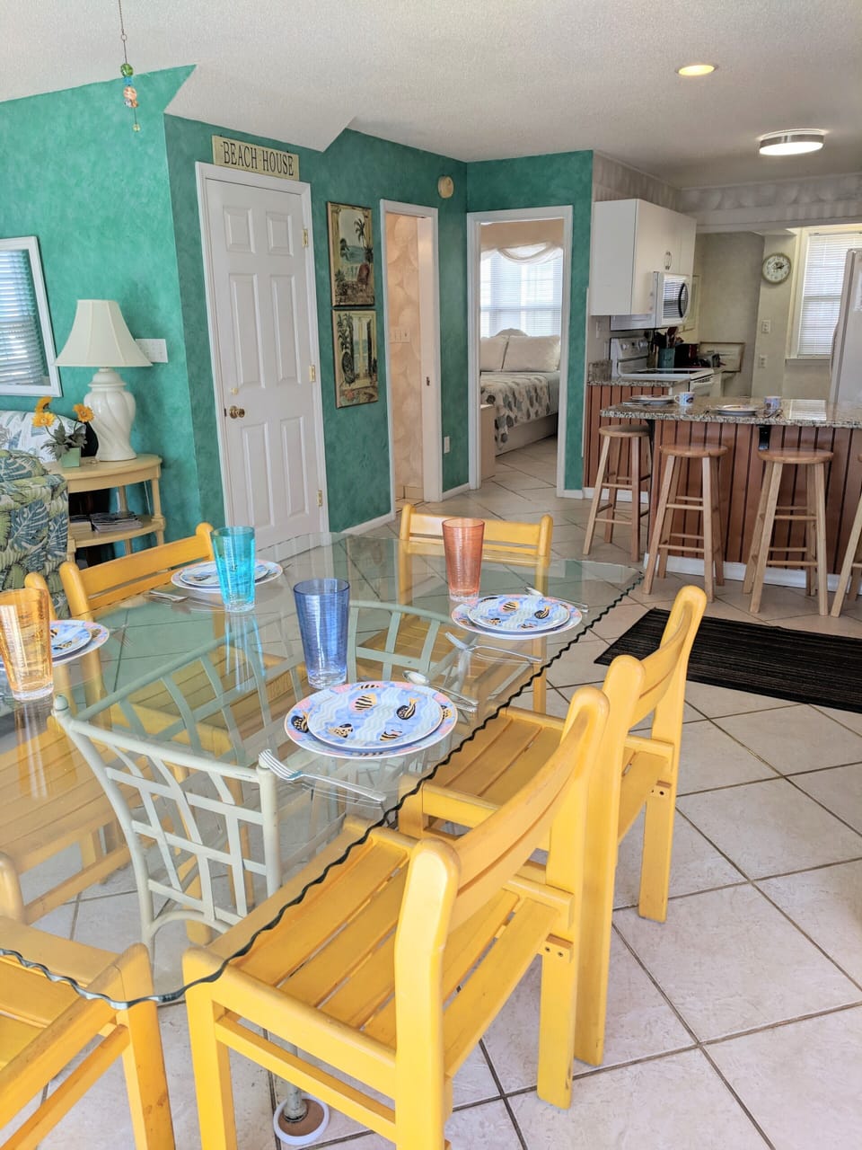 View from dining area to kitchen and downstairs bedroom