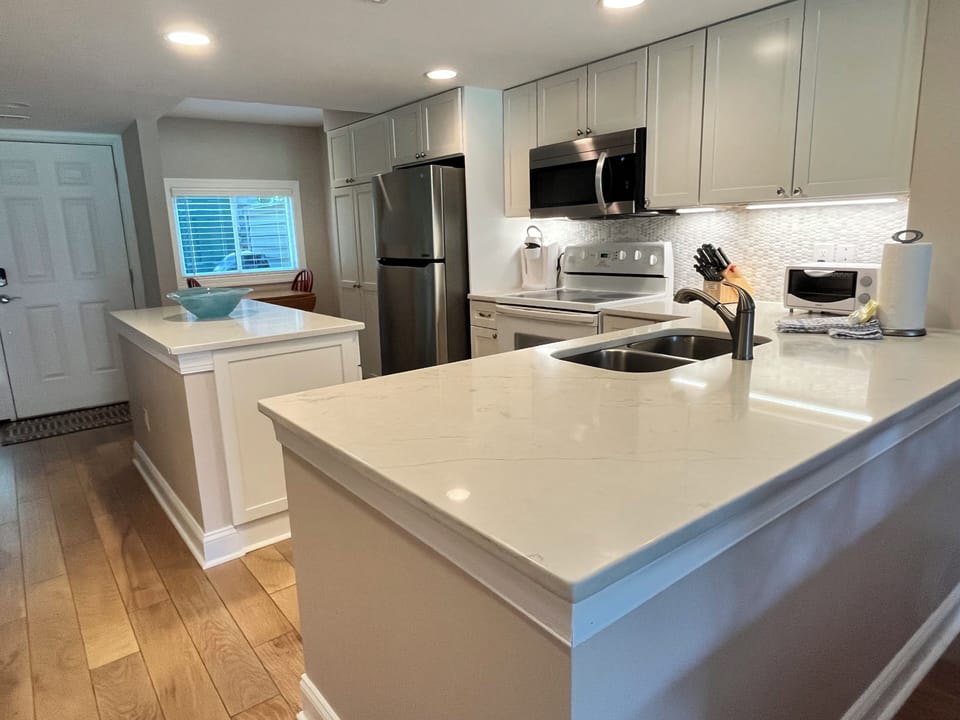 Newly Remodeled Kitchen w/ Open Floor Plan with New Flooring.