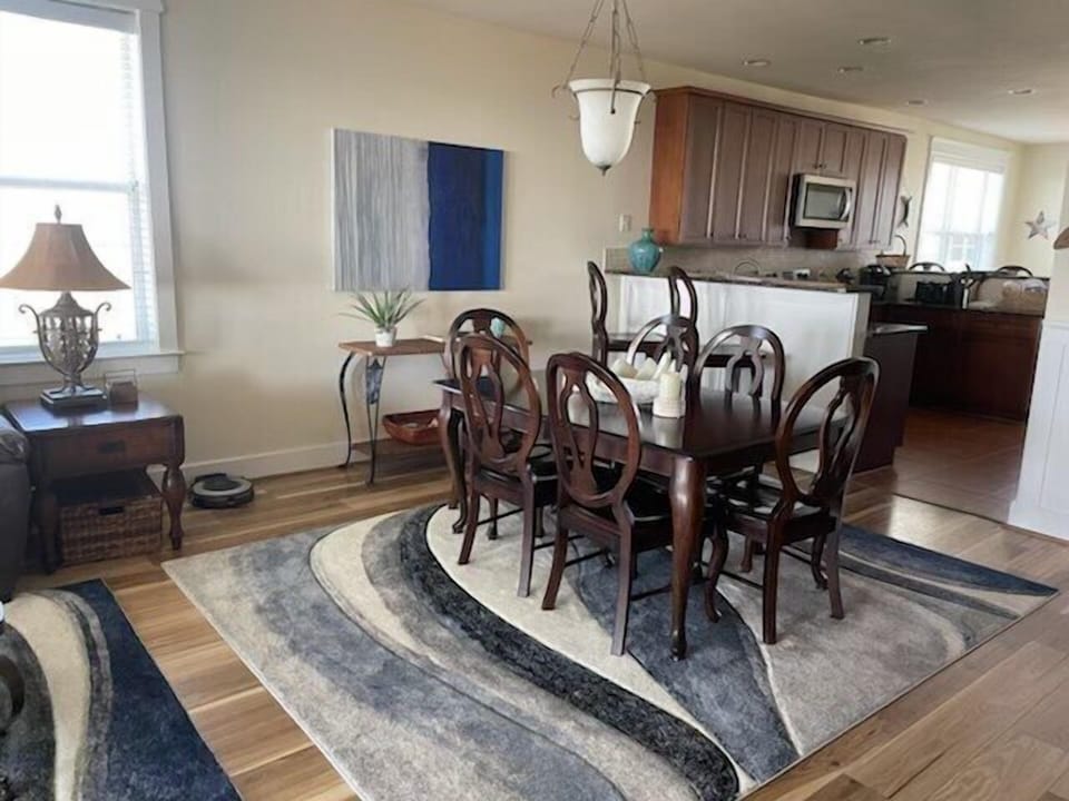 The living room and dining room are open to the galley kitchen.