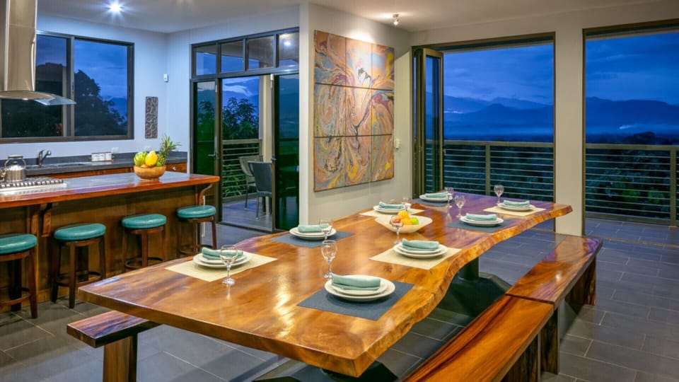 This unique carved teak dining table is large enough for your entire group