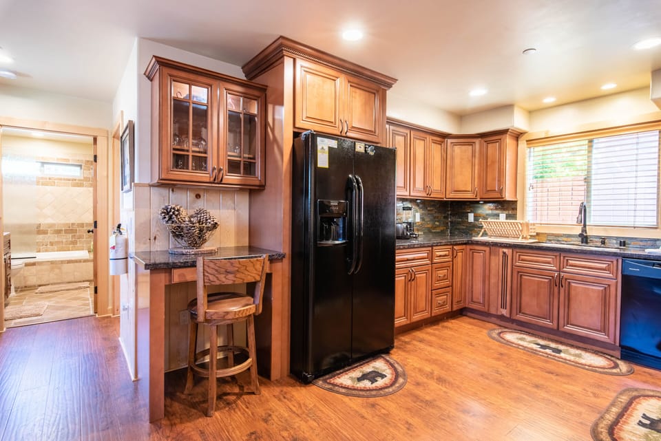 Kitchen located on the first floor between the living room and the master suite.