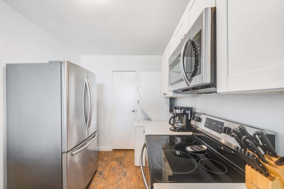 Fully equipped kitchen with stainless steel appliances for your convenience