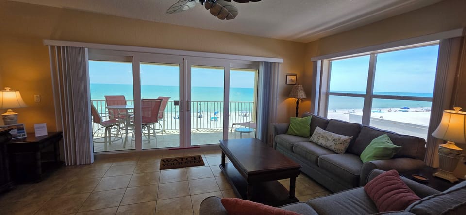 Comfortable Living Room Space with a Stunning Gulf Backdrop