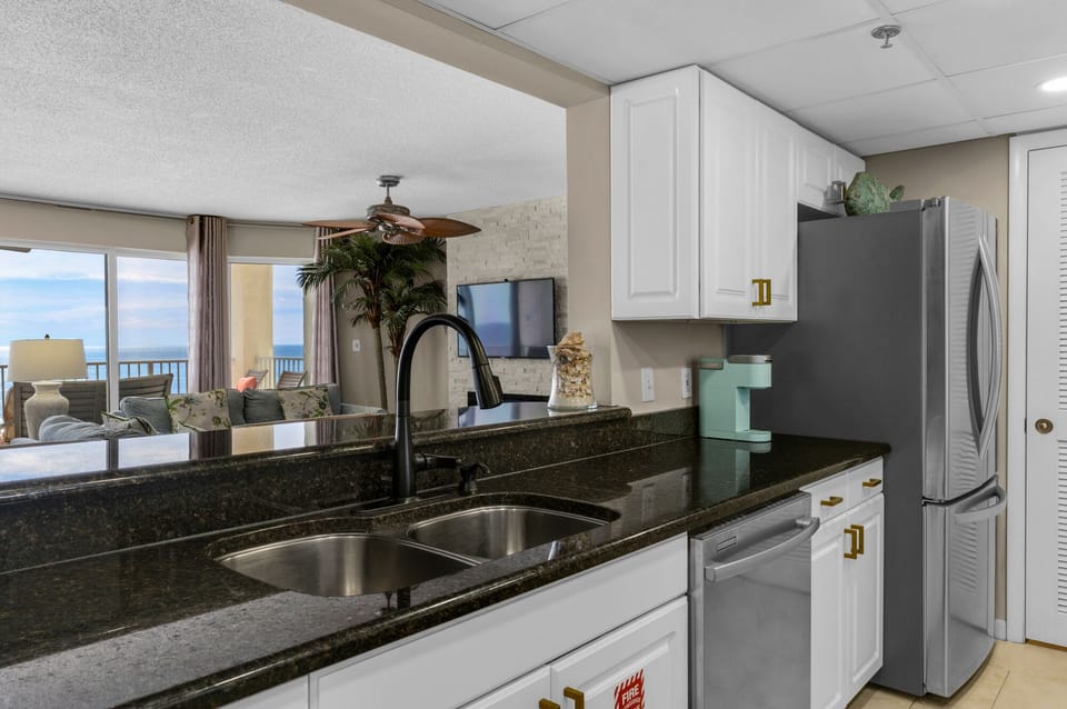 Kitchen is open to living and dining areas
