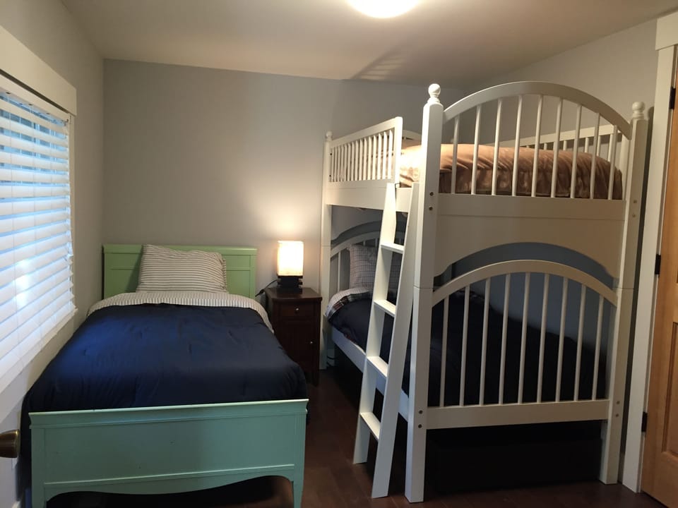 4th Bedroom. Great for the kids. Sleeps 3. All new mattresses.