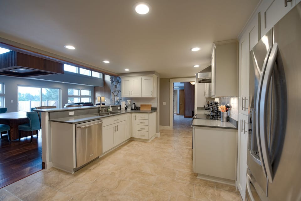 Totally new kitchen, open to the Great room. Countertop bar seats 4.