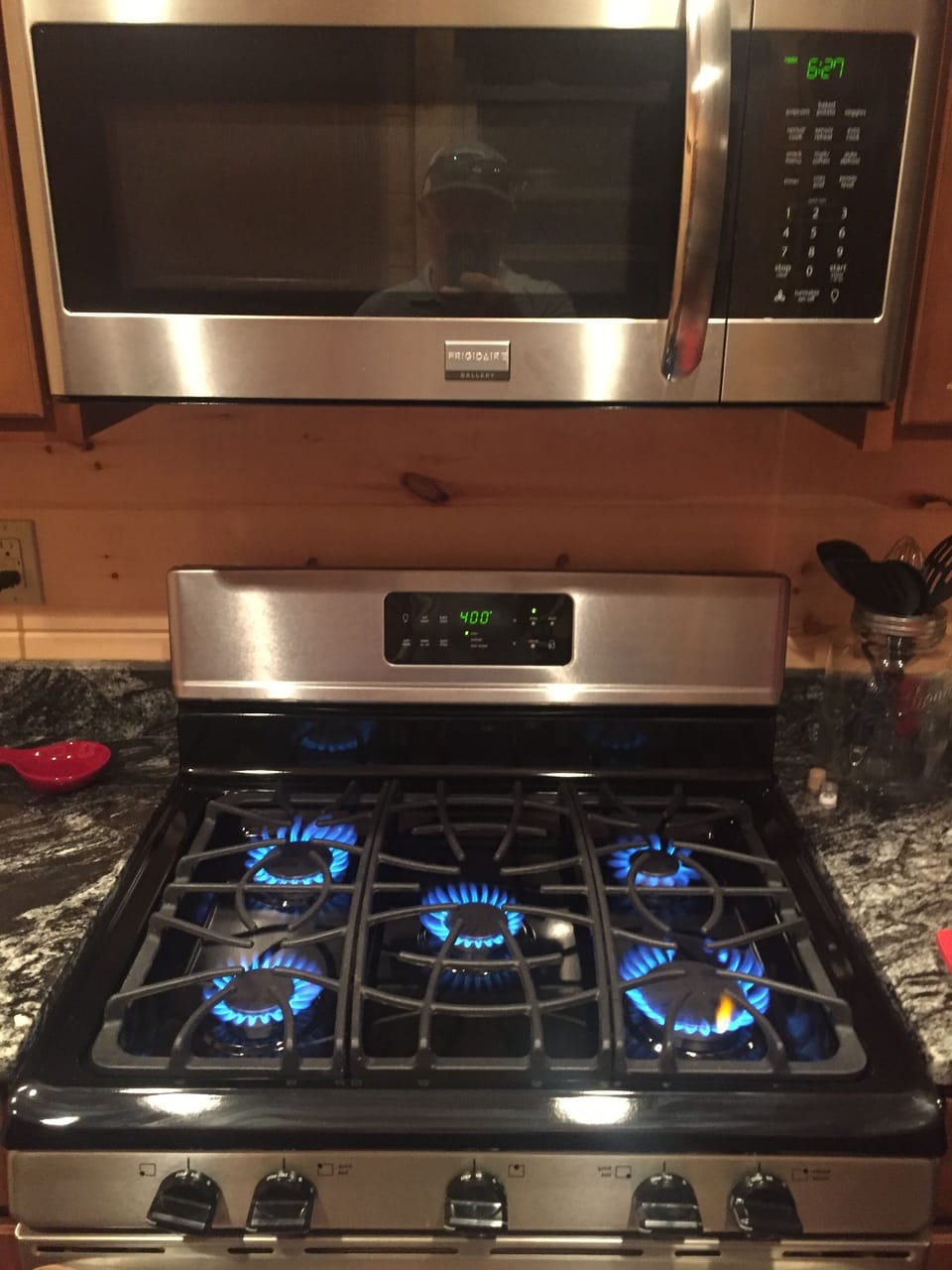 GAS RANGE AND OVEN IN THE FULLY STOCKED KITCHEN,  READY FOR ALL OF YOUR MEALS

