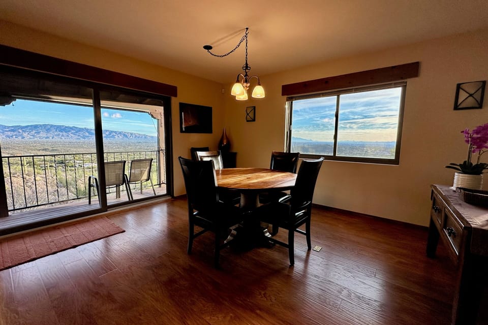 Dining area off of kitchen with deck and amazing views 