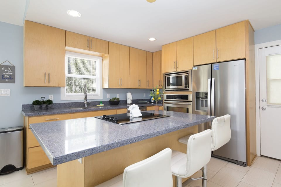 Nicely updated kitchen with center island. Great for cooking meals. Extra seating is located at the kitchen island.