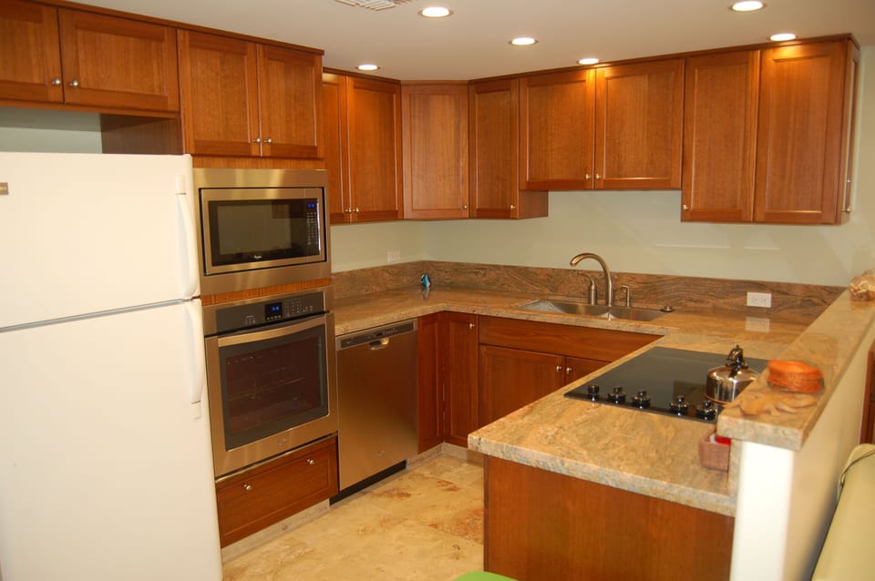 Newly remodeled kitchen with upgraded appliances, cabinets and granite counter.