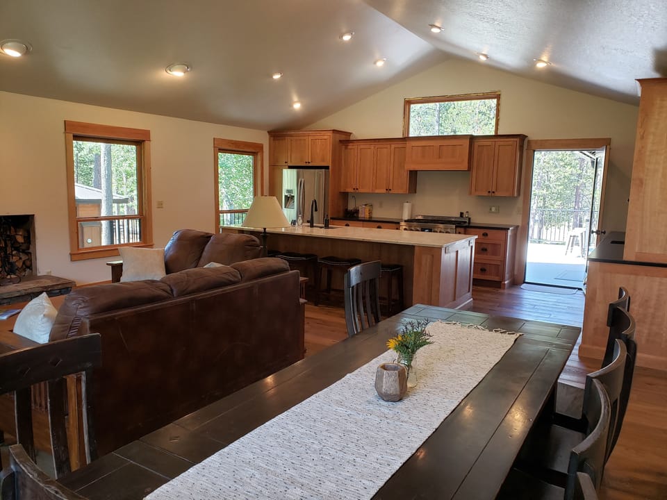 Dining table and kitchen.