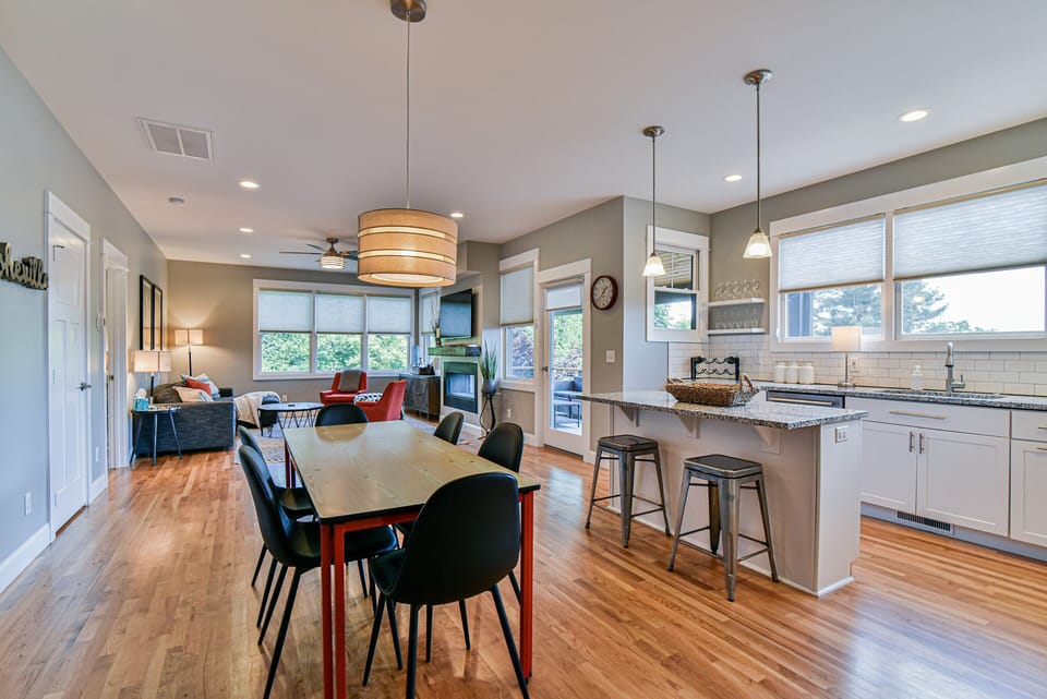 Open-concept living space with modern kitchen and dining area.