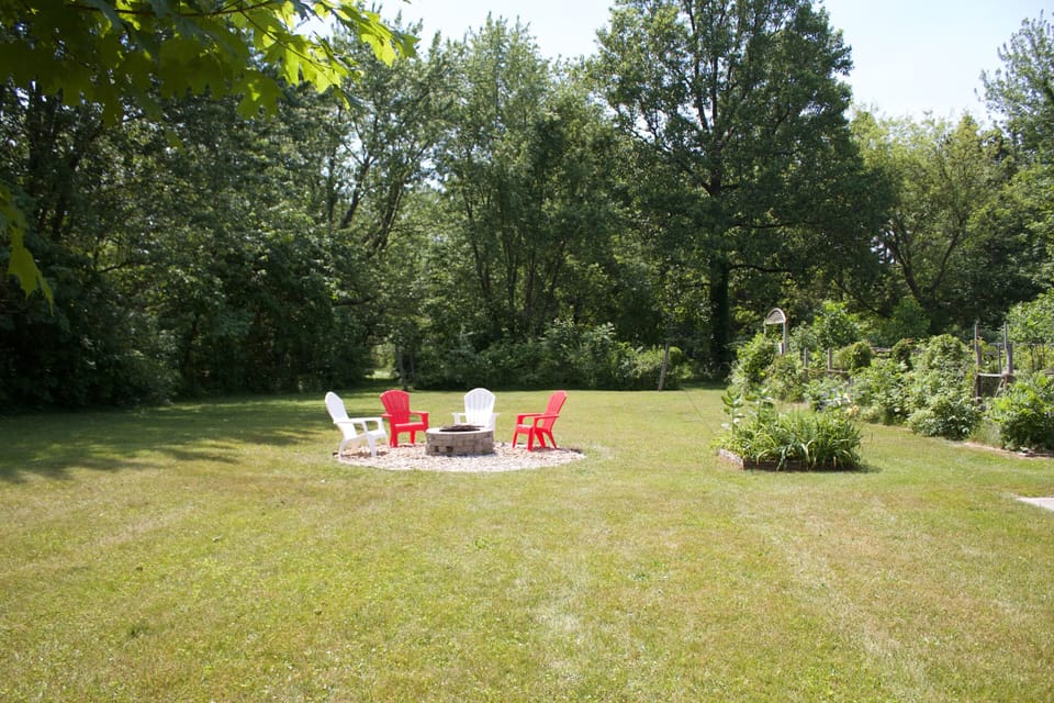 Large acre yard in back, very private, surrounded by mature Tulip Trees!