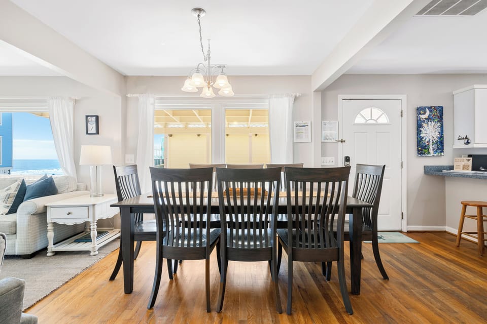 Enjoying a meal in? The dining room table seating 8 people comfortably.