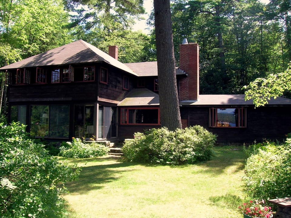 Lake side of house. Master bedrooms, dinning and living rooms have lake views.