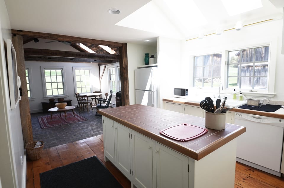 Kitchen with sun room in back