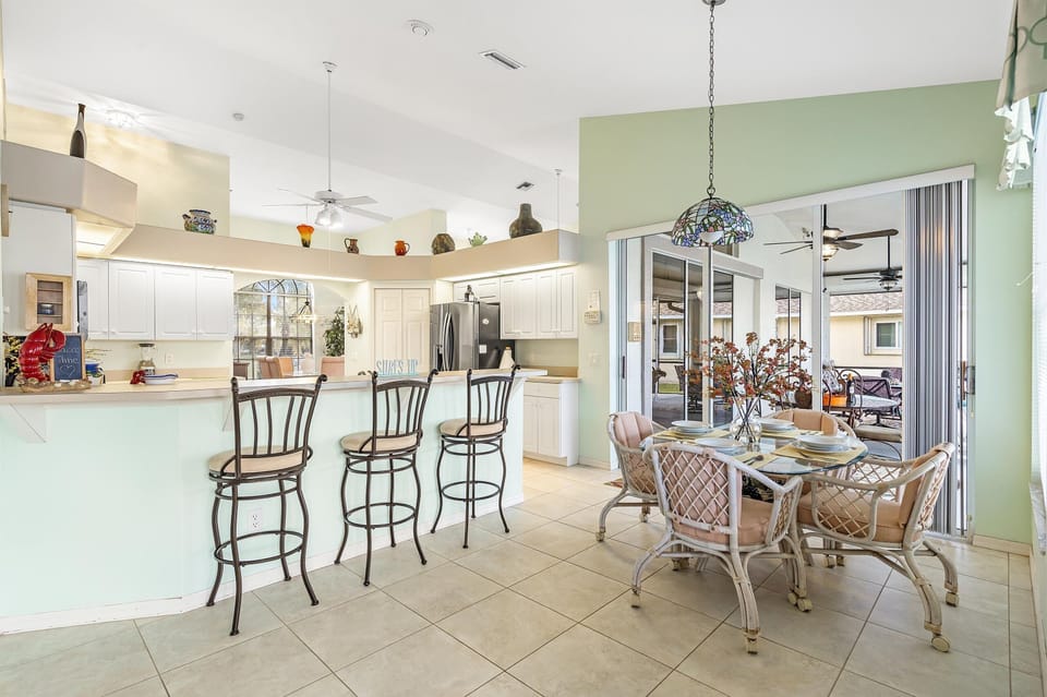 There is a smaller breakfast nook with seating for four and more available at the breakfast bar