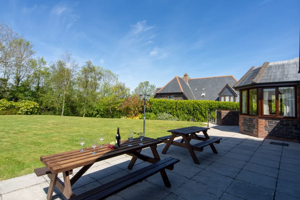 Webbs Retreat, Roserrow. Enclosed landscaped garden and patio area, perfect for using the charcoal barbecue