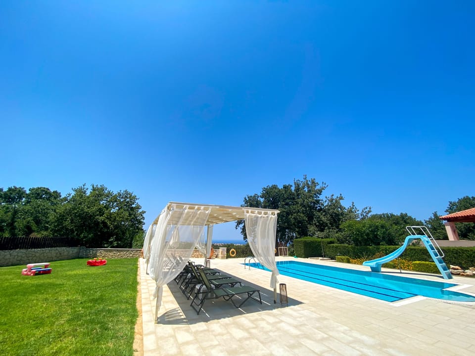 Swimming pool area with pool alarm system for childrens safety.