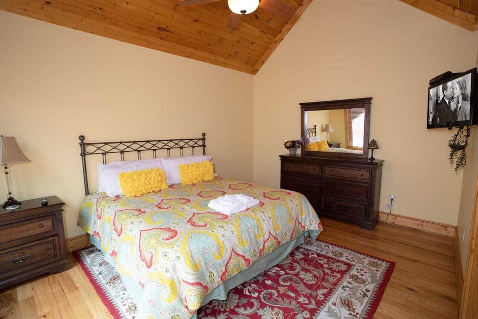 King Bedroom with Mounted TV