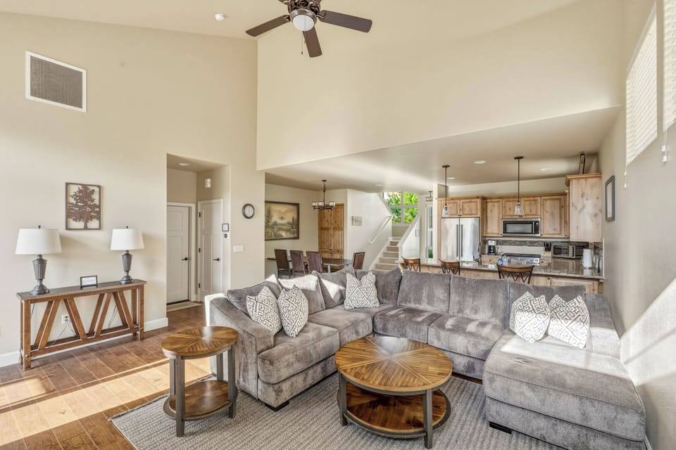 Vaulted great room open to full gourmet kitchen — room to breathe.