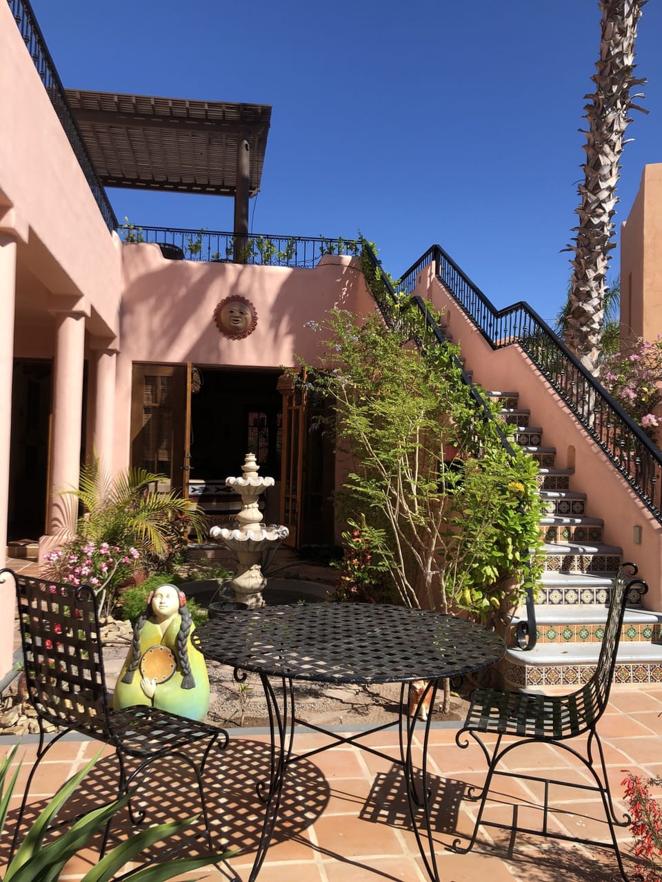 Courtyard with lovely fountain and Maria overlooking your stay