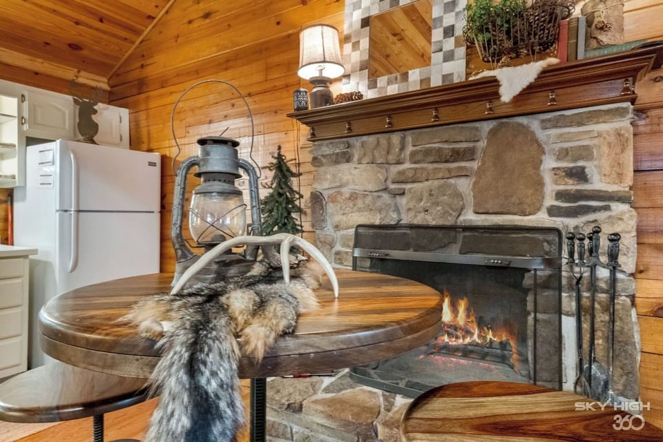 Enjoy your morning coffee or a romantic dinner in front of the stone fireplace.