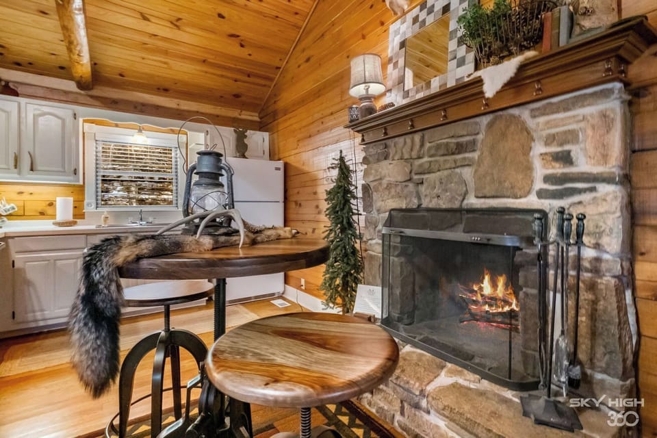 Enjoy your morning coffee or a romantic dinner in front of the stone fireplace.