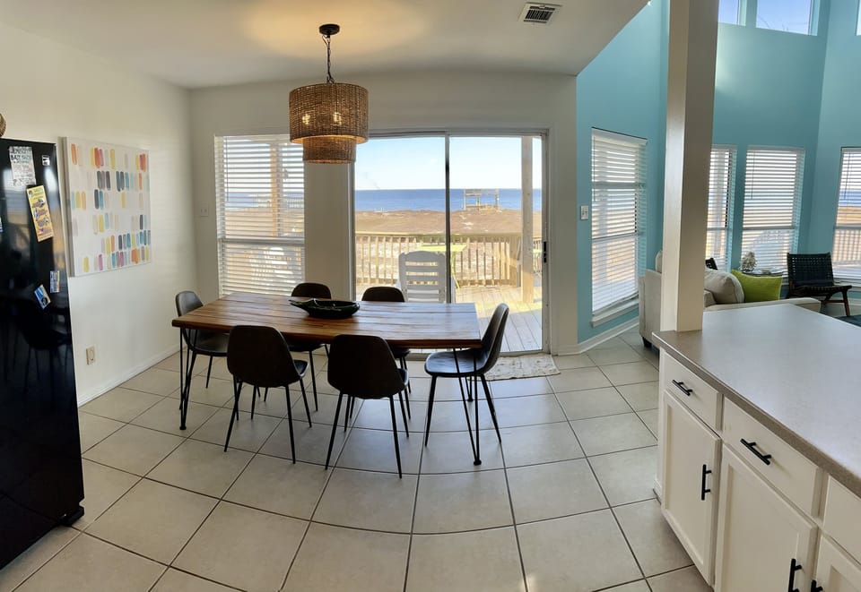 Dining table  - overlooking deck and bay.   