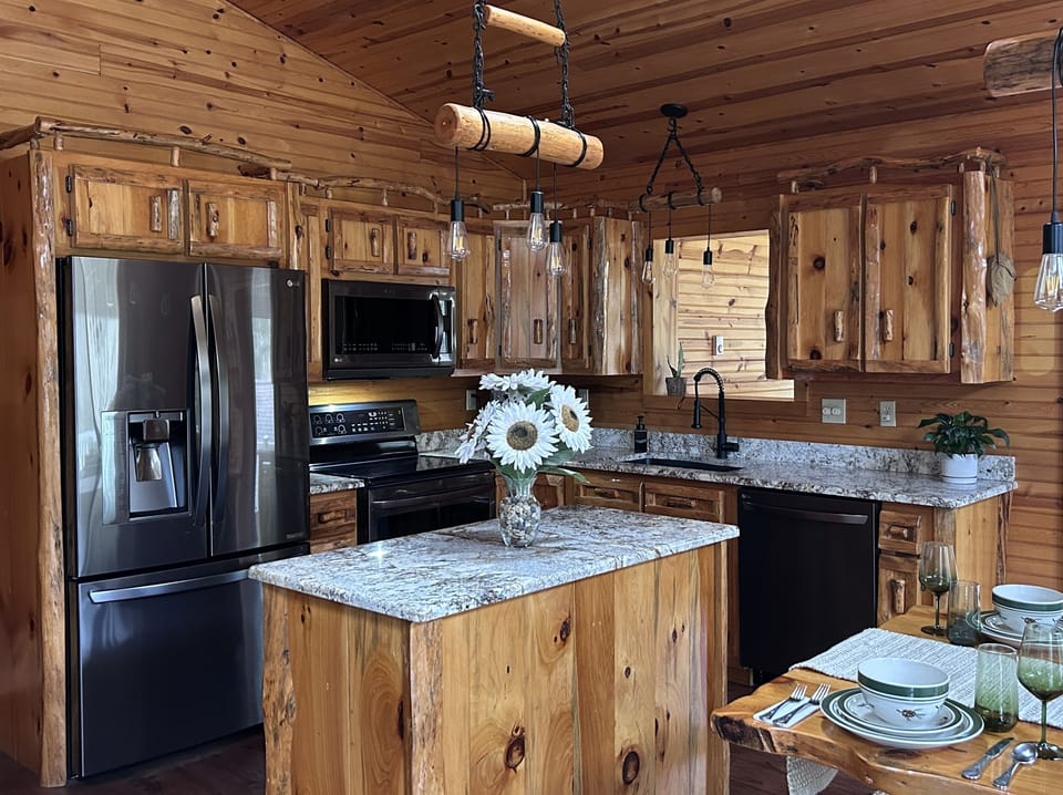 custom kitchen w/ granite countertops